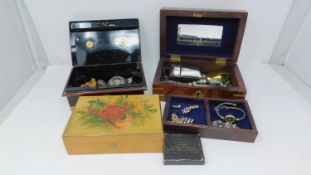 A collection of costume jewellery and jewellery boxes. Including a wooden box with floral design a