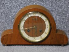 A 1930's Bentima wooden cased mantle clock. With an FHS German movement and gold tone numbers.