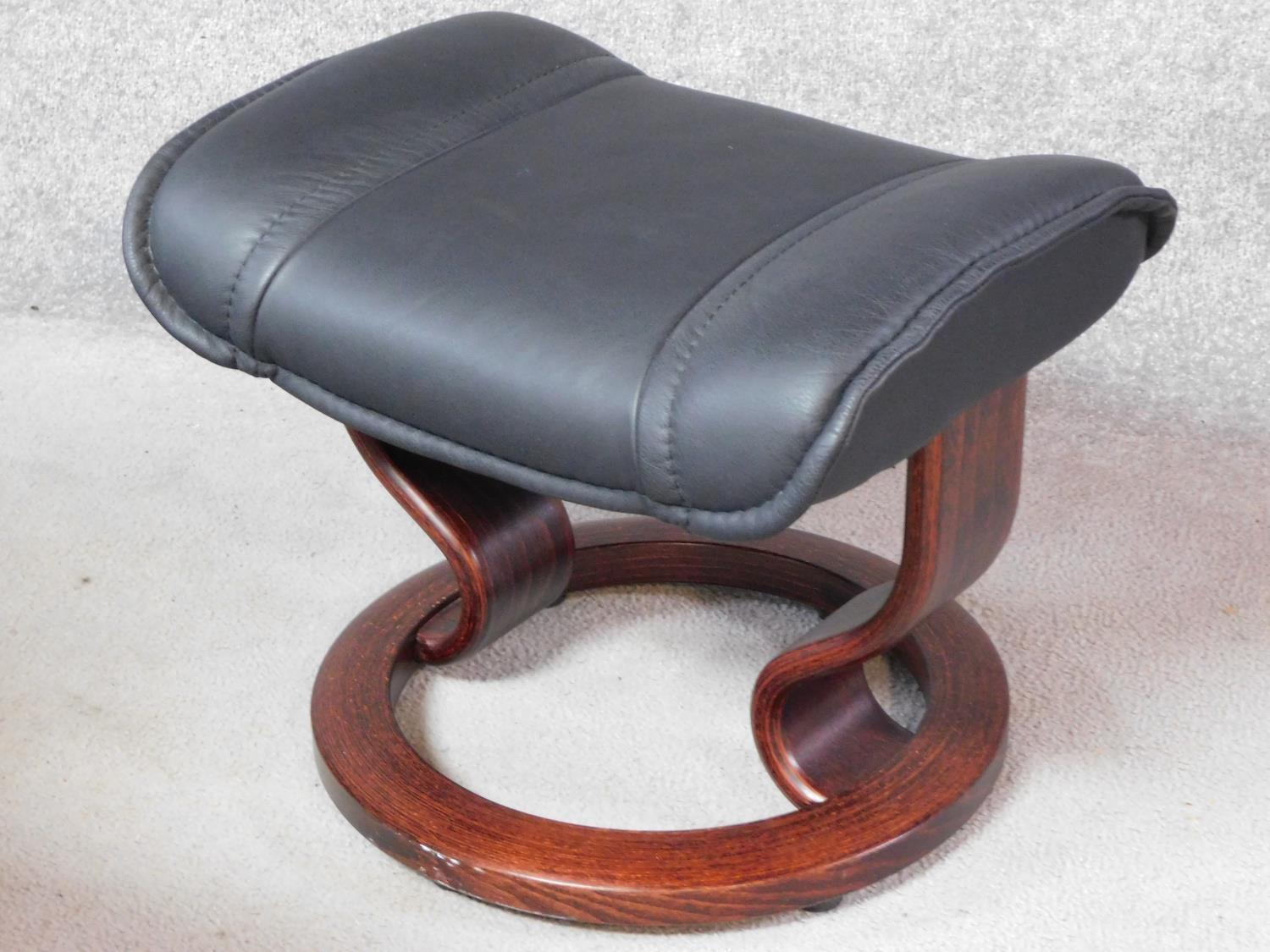 A black leather upholstered 'Stressless' Ekornes adjustable revolving armchair with matching - Image 3 of 5