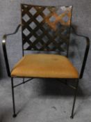 A metal framed conservatory armchair with lattice work back. H.91cm