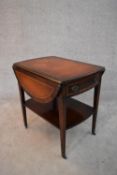 A Georgian style mahogany drop flap occasional table with tooled leather inset top. H.70x68cm (ext.