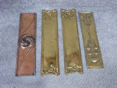 Four Art Nouveau brass and copper door plates. The two mistletoe design plates are stamped to the