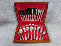 A six person mahogany cased canteen of silver plate cutlery. Made by Newbridge, A1 silver plating.