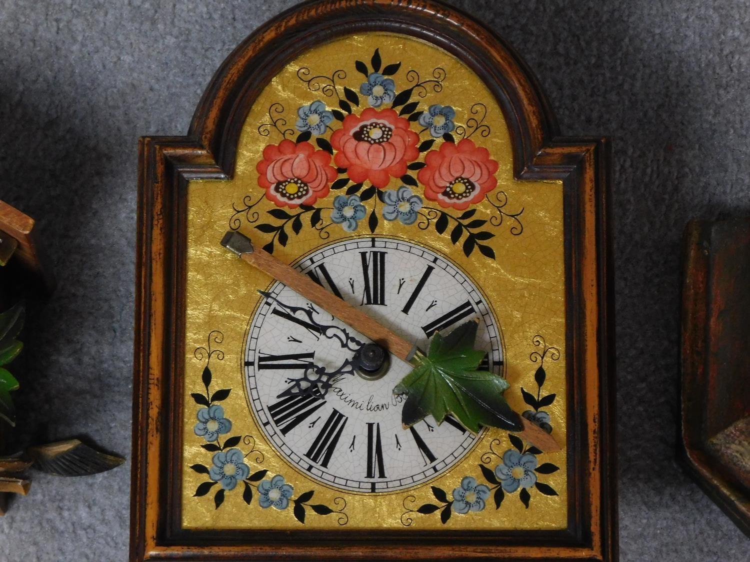 Two vintage Continental wall clocks and a painted plaster plinth base. One clock is a carved - Image 3 of 7