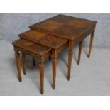 A Georgian style walnut nest of three graduating occasional tables on square tapering supports. H.54