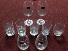 A collection of glasses including a pair of Dartington crystal tumblers and a pair of Dartington