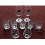 A collection of glasses including a pair of Dartington crystal tumblers and a pair of Dartington