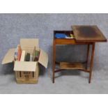 A mahogany foldover top card and compendium games table together with a collection of board games,