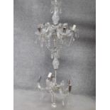 A cut glass and blown glass two tier hanging chandelier. H.110 W.50cm