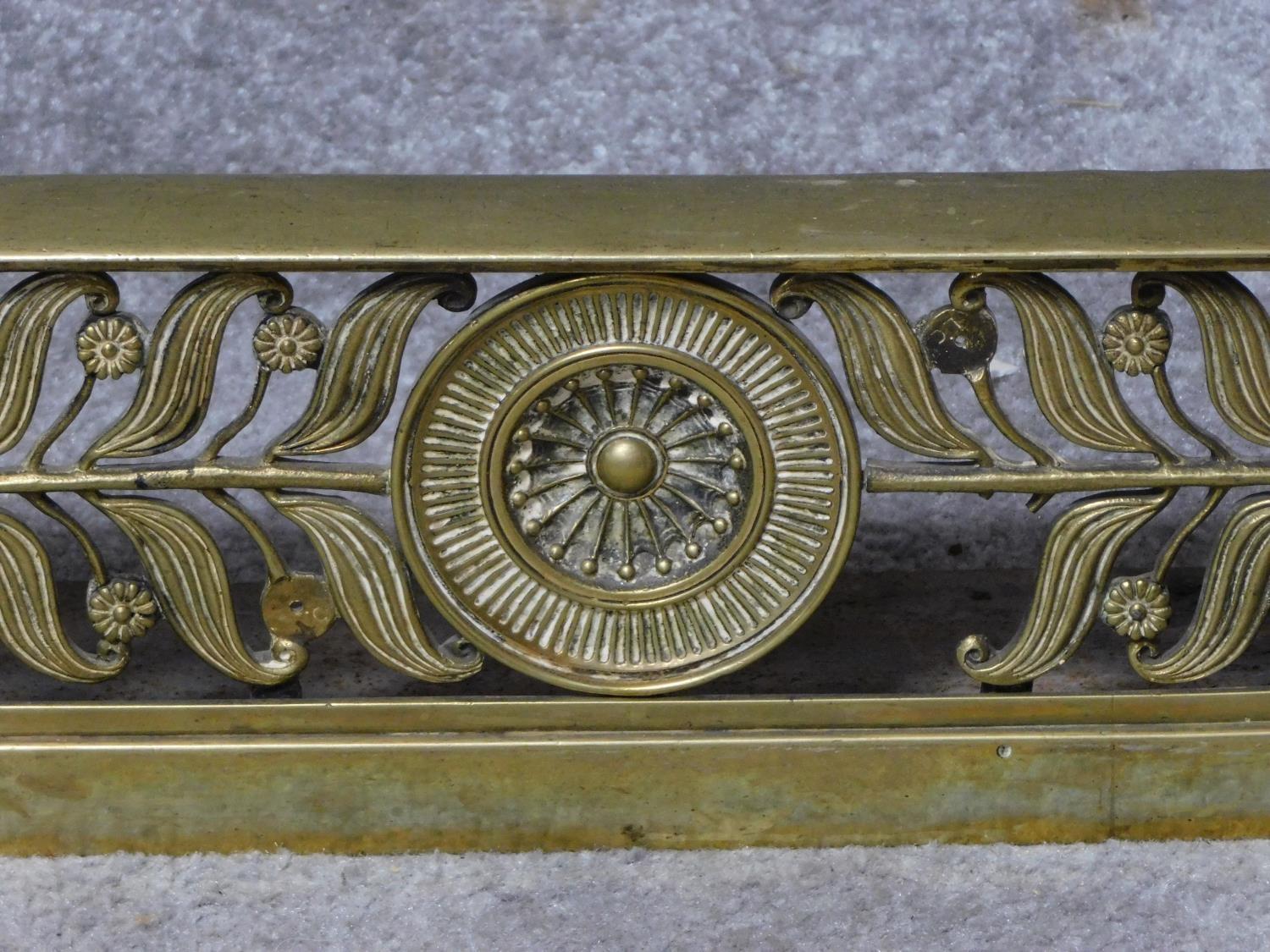 A 19th century brass fire kerb together with a pair of andirons. H.110cm - Image 4 of 4