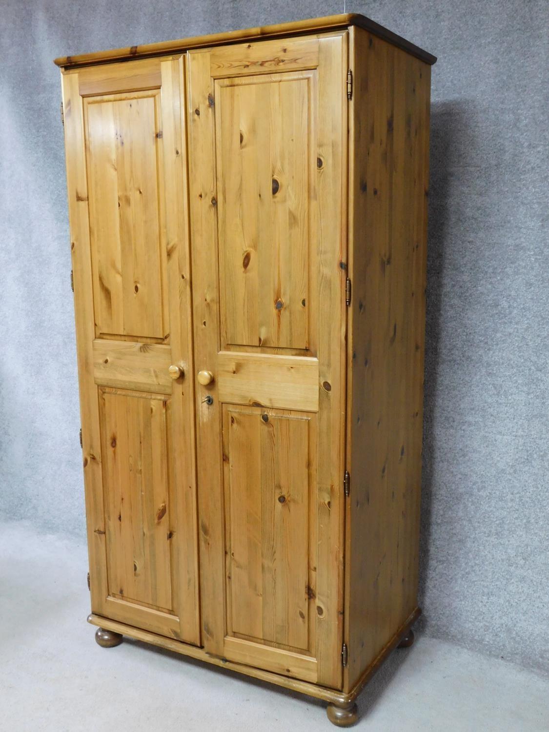 A contemporary pine wardrobe with mirror to interior of panel door. By English maker Victoria. H.183 - Image 2 of 6