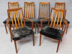 A set of six vintage teak G-plan dining chairs in charcoal grey dralon upholstery, to include two