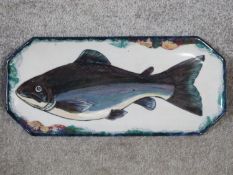 An octagonal Highland Stoneware hand painted fish plate, illustrated by Audrey Payton. Makers mark