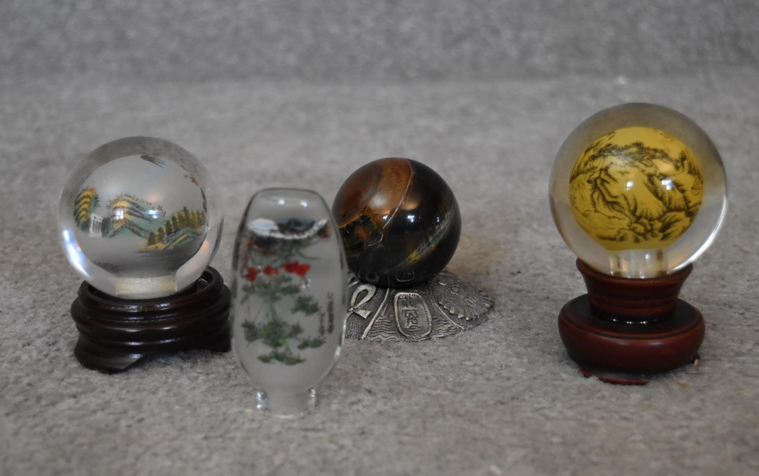 Two Japanese reverse painted globes with Japanese mountains and landscapes, a Japanese reverse