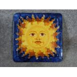 An Italian Ceramiche Artistiche Gialletti Giulio handpainted majolica sun dish. Signed to back and