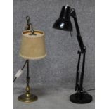 A black enamel vintage anglepoise lamp and an antique brass adjustable arched table lamp. H.75cm (