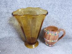 A vintage amber art glass trumpet vase and a vintage Italian ceramic jug by Elbee, stamped made in