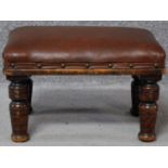 A small 19th century mahogany framed leather upholstered stool on turned tapering supports. H.24 W.