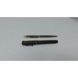 A sterling silver Parker biro with gold tone accents with crosshatch design and antique '