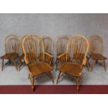 A set of eight vintage Continental Windsor style dining chairs, including two armchairs. H.110cm