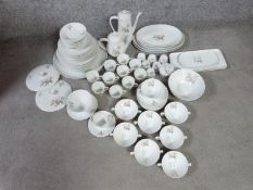 A Rosita design Excellenz Shape Hutschenreuther porcelain part dinner service. Makers stamp to base.