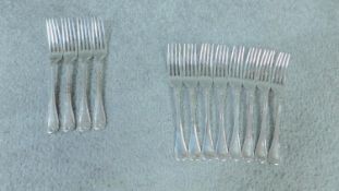 A set of twelve antique sterling silver forks. A set of four H J Lias & Son forks hallmarked: