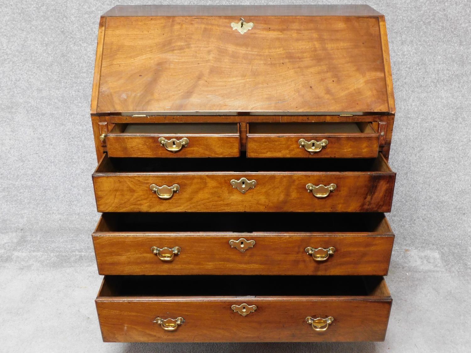 A Georgian mahogany bureau with fitted interior above two short over three long graduating drawers - Image 3 of 7