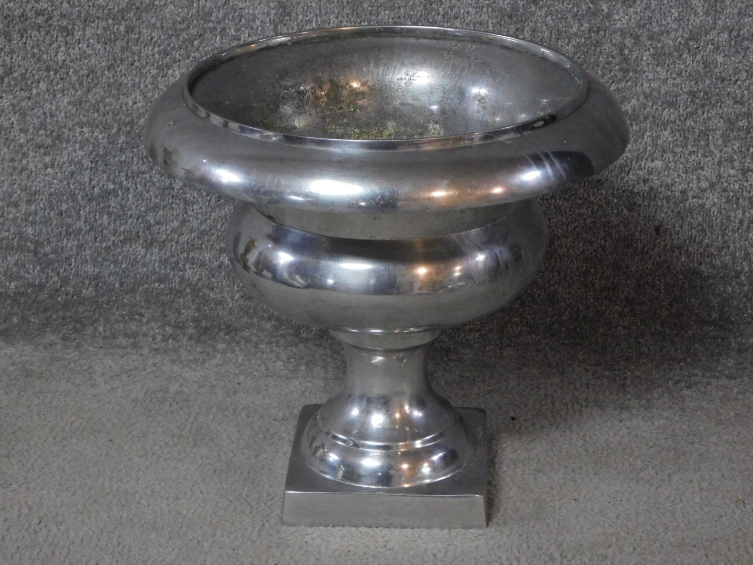 A vintage aluminium pedestal urn planter H.30 W.33 D.33cm