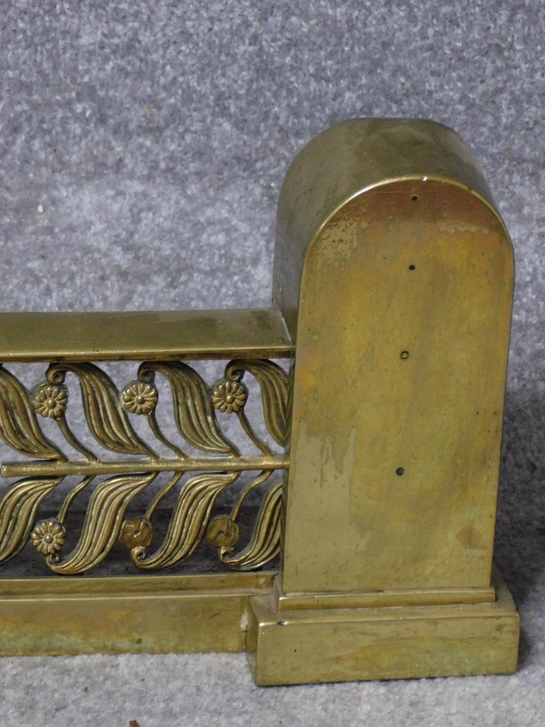 A 19th century brass fire kerb together with a pair of andirons. H.110cm - Image 3 of 4