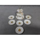 A vintage three tier floral design cake stand by Clarice Cliff along with a set of six Royal