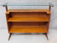 A 1970s vintage teak living room drinks bar with plate glass top. H.107 W.133 D.41cm