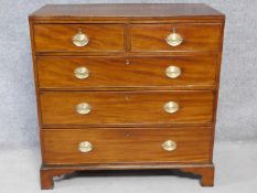 A Georgian mahogany chest of two short over three long drawers on bracket feet. H.99 W.110 D.50cm