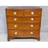 A Georgian mahogany chest of two short over three long drawers on bracket feet. H.99 W.110 D.50cm