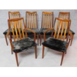 A set of six vintage teak G-plan dining chairs in charcoal grey dralon upholstery, to include two