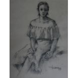 A framed and glazed pencil sketch of a woman sitting in a dress, indistinctly signed. 48x41cm