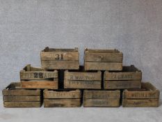 A collection of nine vintage wooden bottle crates. Some with makers stamps to side. H.28 W.37 D.54cm
