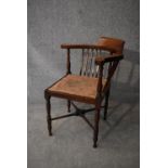 An Edwardian mahogany corner chair. H.74x50cm
