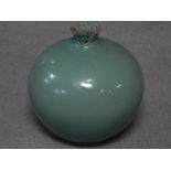 A 20th century Korean Blue celadon crackle glaze pomegranate vase with pierced neck. Artist's
