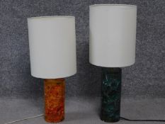 A pair of vintage crackle acrylic cylinder base table lamps and shades. One amber and one turquoise.