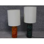 A pair of vintage crackle acrylic cylinder base table lamps and shades. One amber and one turquoise.