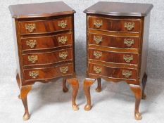 A pair of Georgian style flame mahogany bedside chest of four drawers on cabriole supports. H.74 W.