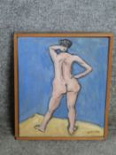 A framed oil on canvas of a female nude figure fromthe back by British artist John Nicoll. Signed