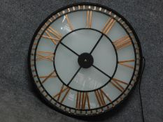 A glass fronted shop display clock with gilded roman numerals, wired and internally lit. 80x80