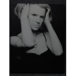 A large monochrome print of a female model. 76x60cm