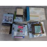 A collection of seventeen fabric swatch books mostly from the Designers Guild, Clarke & Clarke and