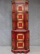 A Continental polychrome painted and lacquered two section corner cabinet. H.181 W.68 D.45cm