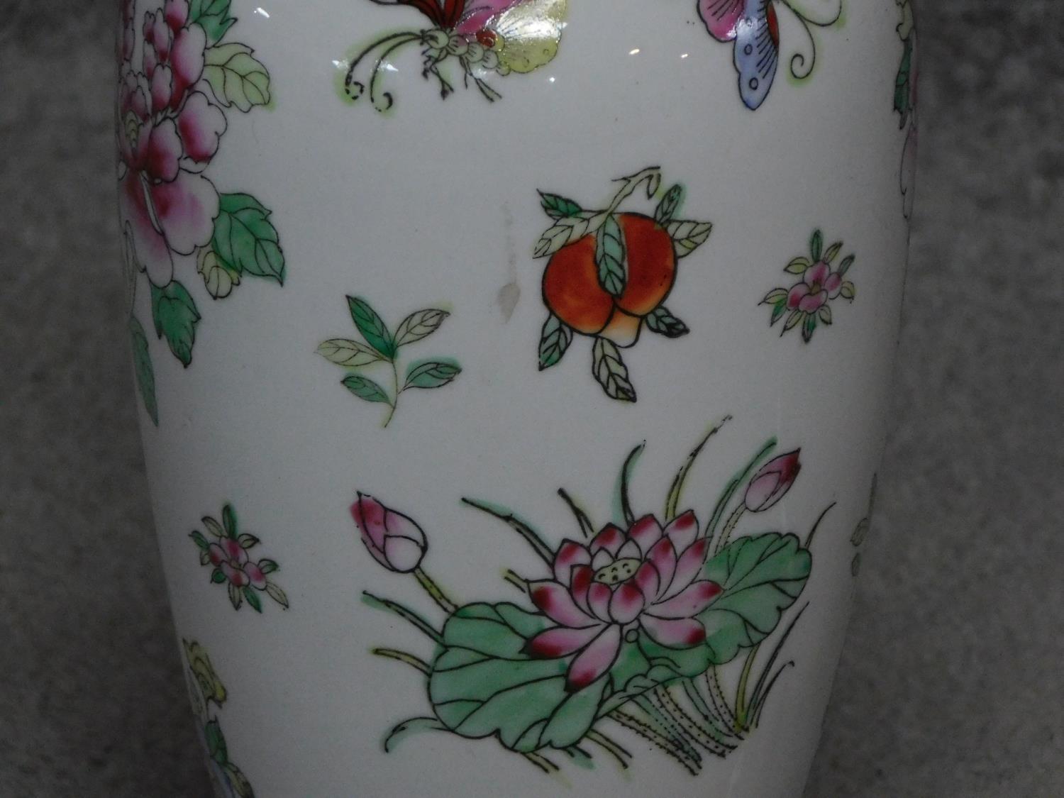 A vintage hand painted porcelain Chinese vase lamp base on carved hard wood stand. With floral and - Image 3 of 4