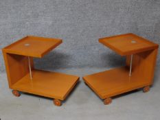 A pair of contemporary two tier wheeled trollies by Ligne Roset. H.56 W.45 D.65cm