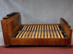 A vintage Continental Art Deco style rosewood teak and ebonised double bedstead. H.115 W.230 D.178cm