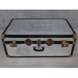 A contemporary aluminium traveling trunk. H.33 W.84 D.51cm